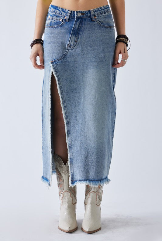 Must Be denim maxi skirt in lmedium wash featuring a off center slit