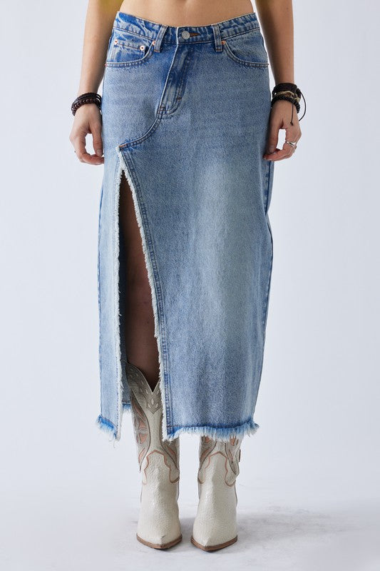 Must Be denim maxi skirt in lmedium wash featuring a off center slit