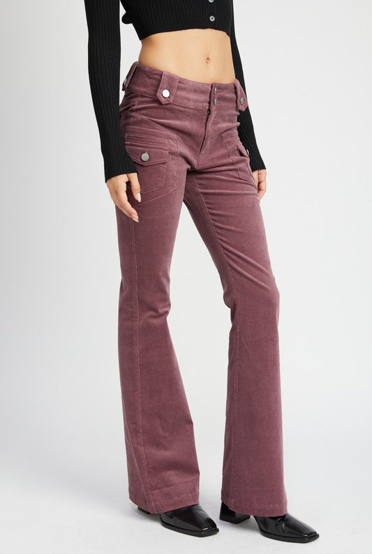 Close-up of the wine colored corduroy fabrication and side cargo pocket detail