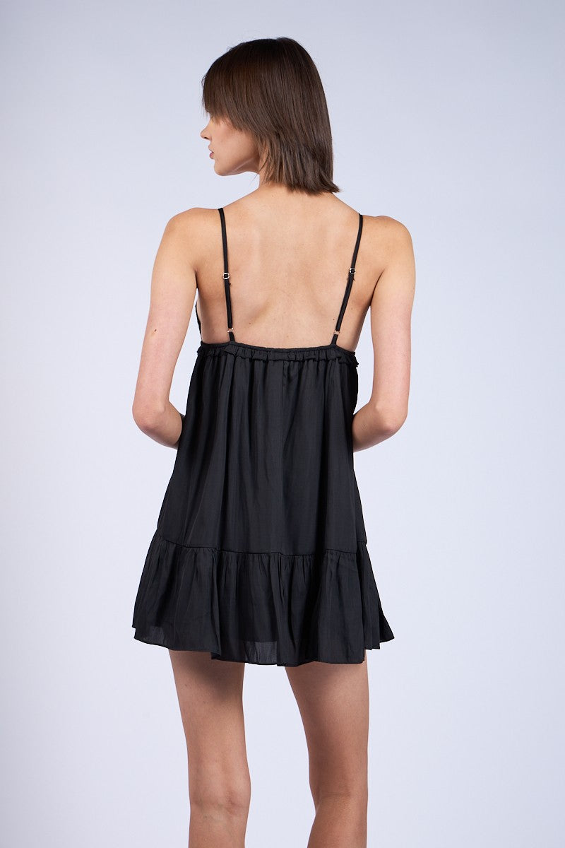 Back View: Annie Black Babydoll Dress styled for date night.