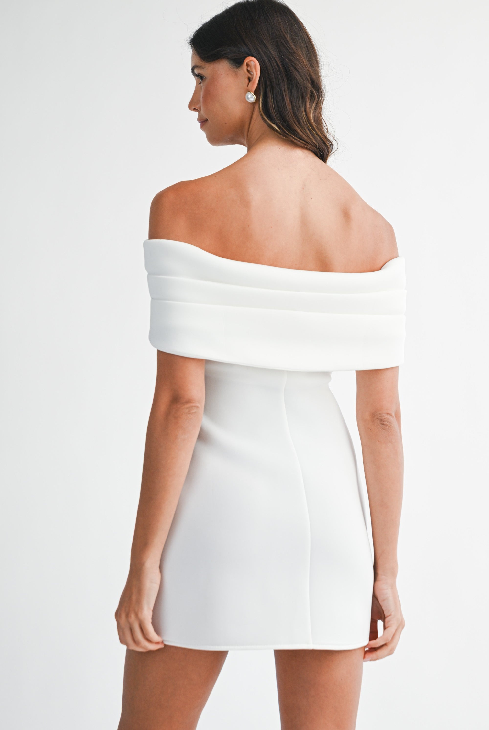 Back view of the Tina dress highlighting the off-the-shoulder neckline