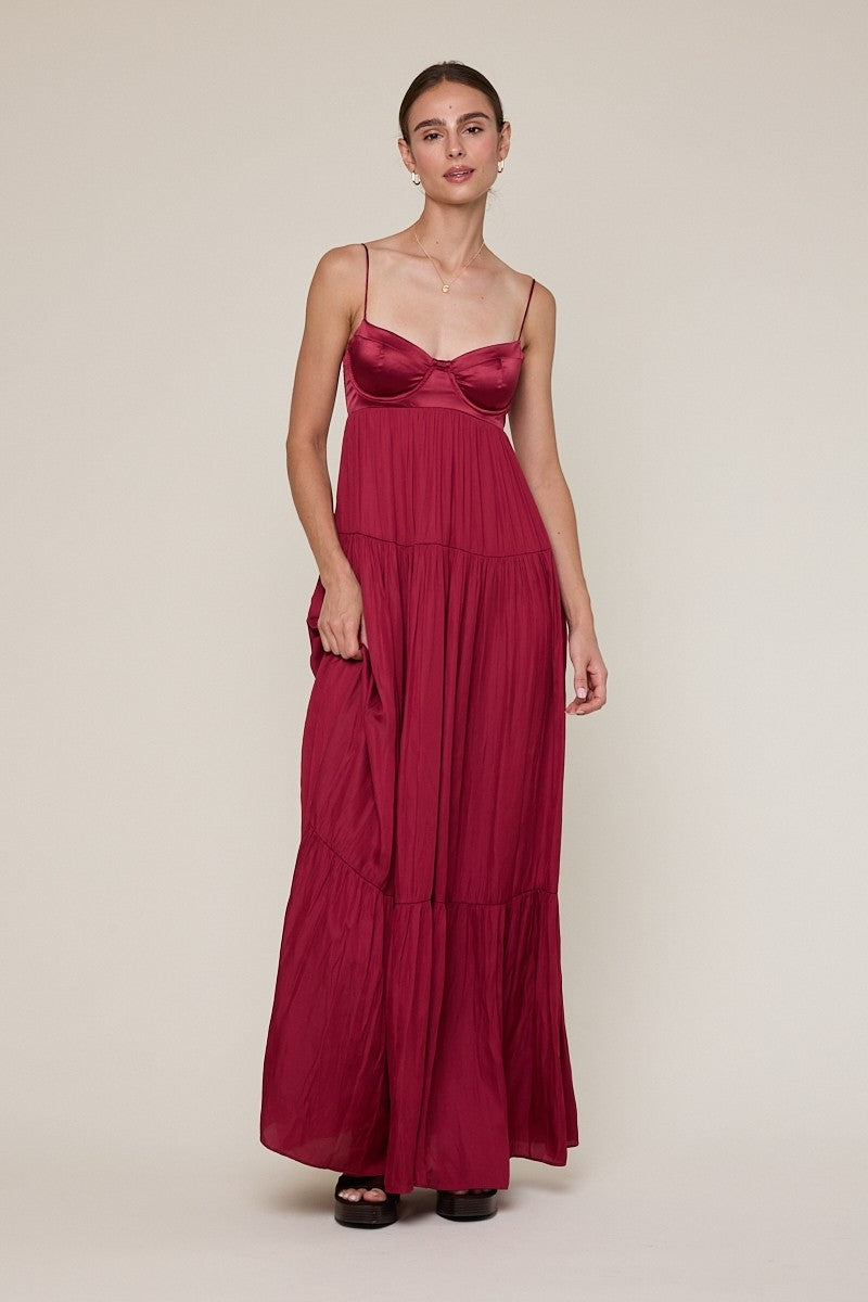 Burgundy satin bustier maxi dress for prom or black-tie wedding guests.