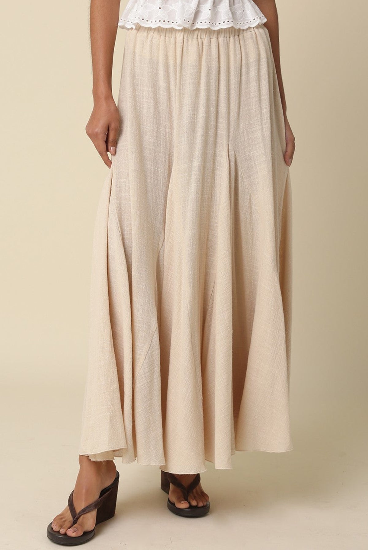 Beige boho maxi skirt for women with flowy godet panels