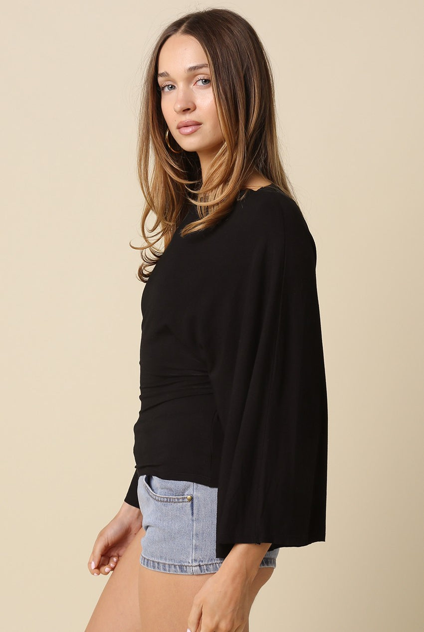 Black dolman sleeve knit top with wide sleeves