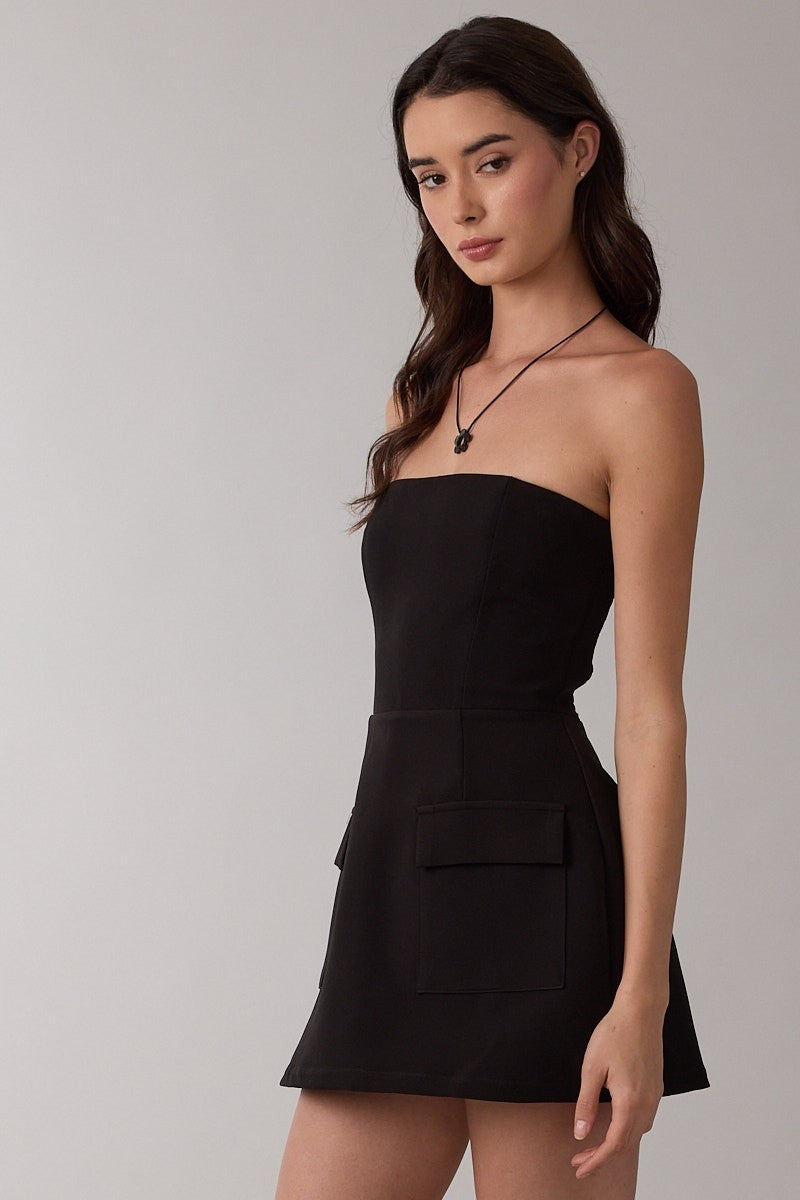 Close-up of side pockets on the Lara black strapless mini skirt with built in shorts by Sky to Moon