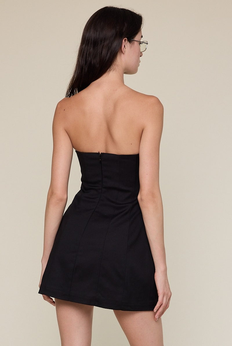 Back view of the Taylor black strapless mini dress with a clean, seamless finish