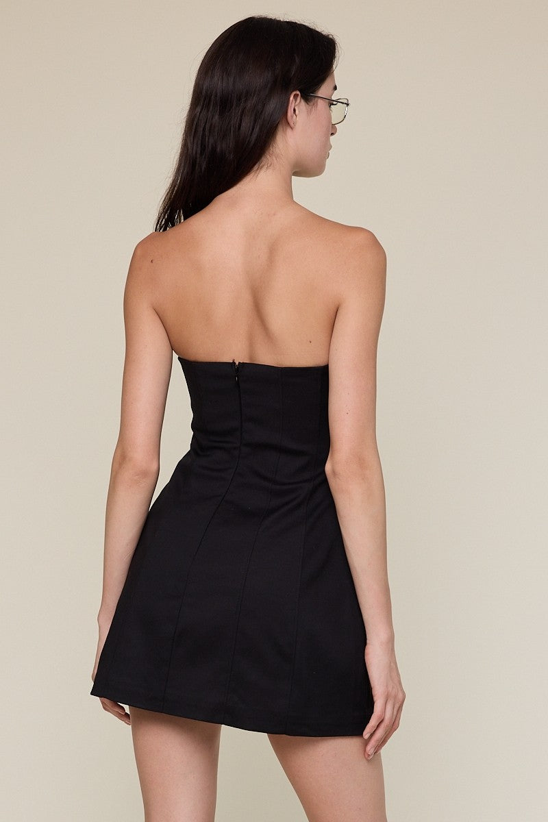 Back view of the Taylor black strapless mini dress with a clean, seamless finish