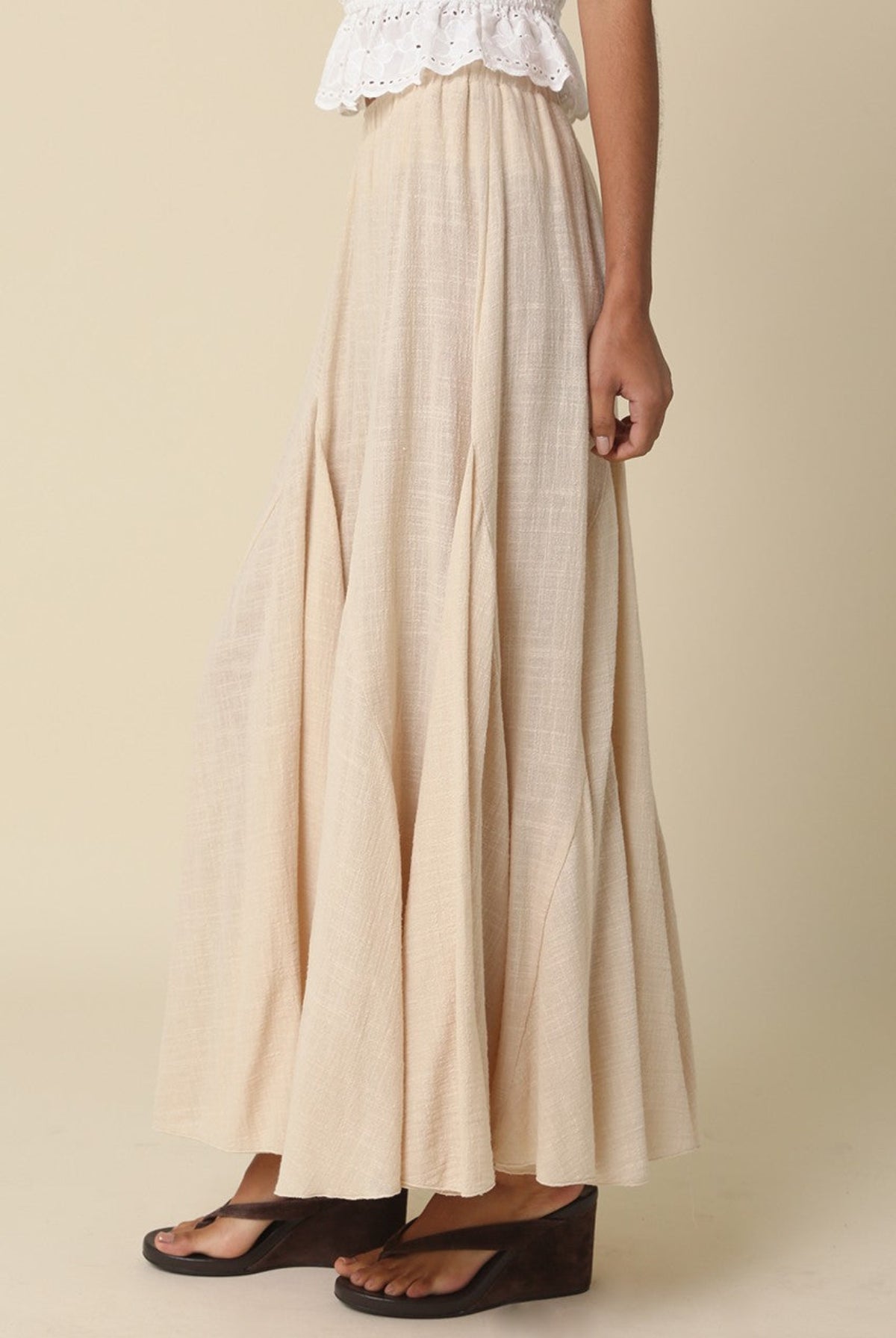 Beige cotton boho maxi skirt with elastic waist and godet silhouette