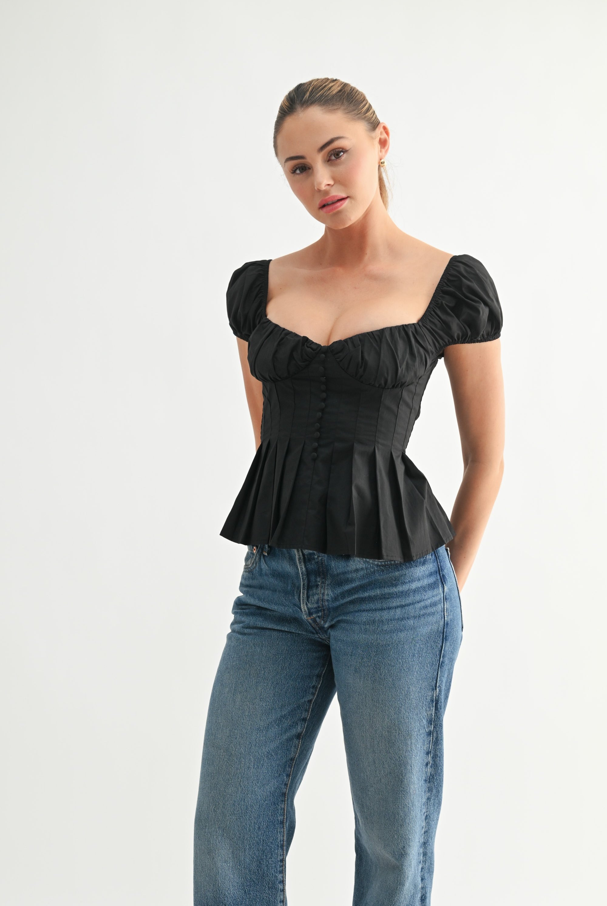 Black puff sleeve corset top with sweetheart neckline