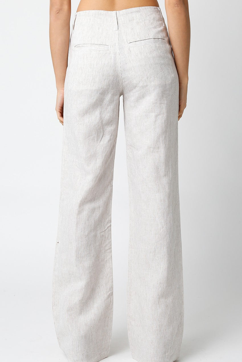 Back view of khaki striped wide leg linen pants.