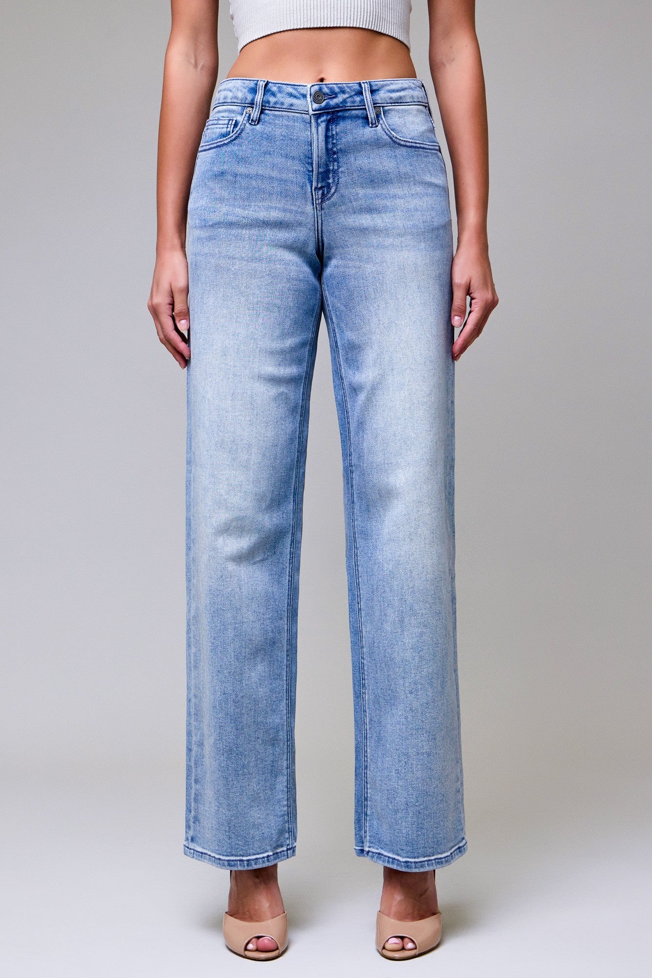 Close up of the vintage light wash and high-quality stretch denim texture on the Monica dad jeans.