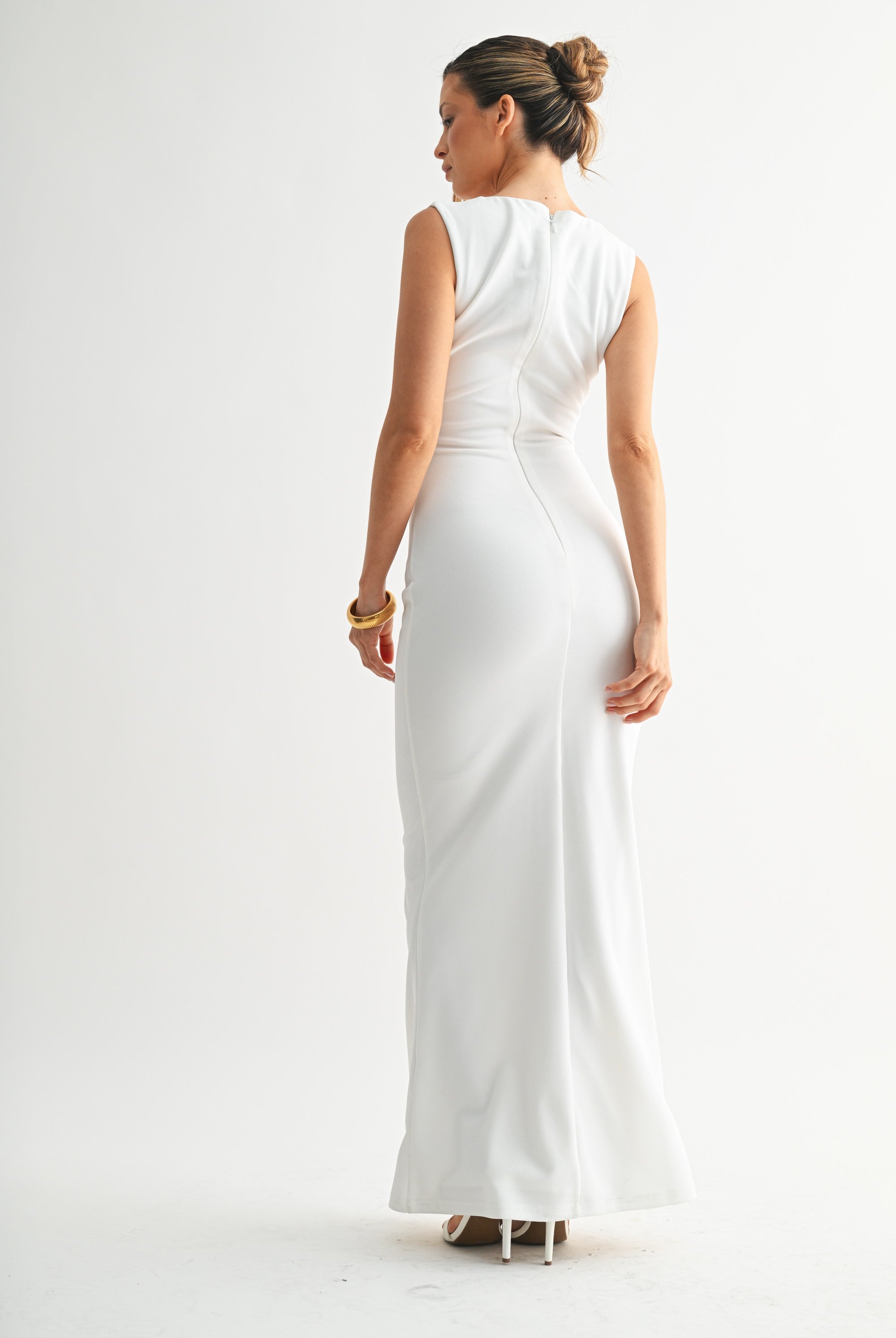 Back view of the Savanna white gown showing the seamless fit and hidden zipper