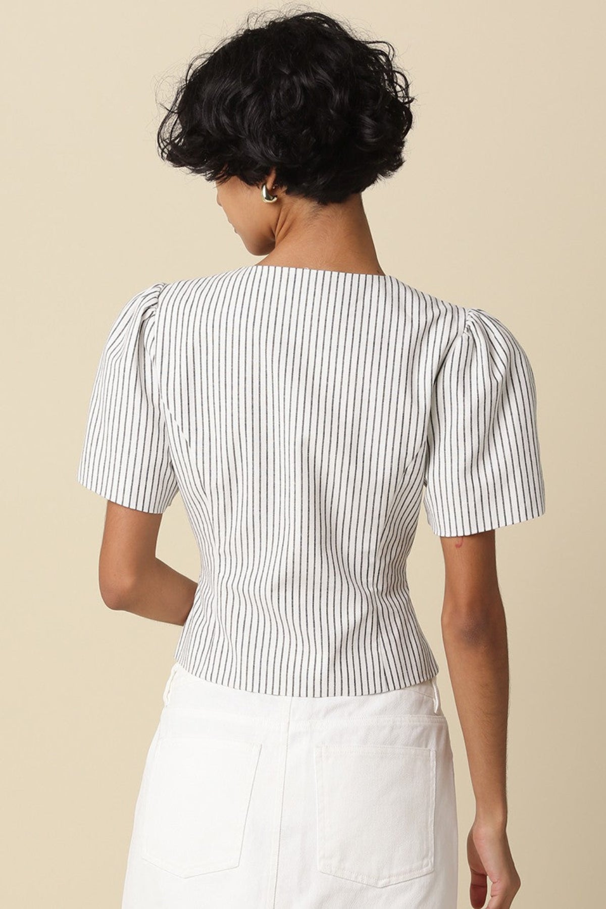 white and black stripped puff sleeve top back view