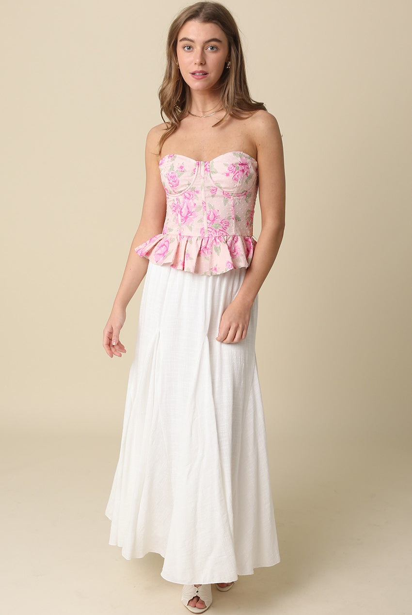 Flowy ethereal white maxi skirt with sweeping hemline.