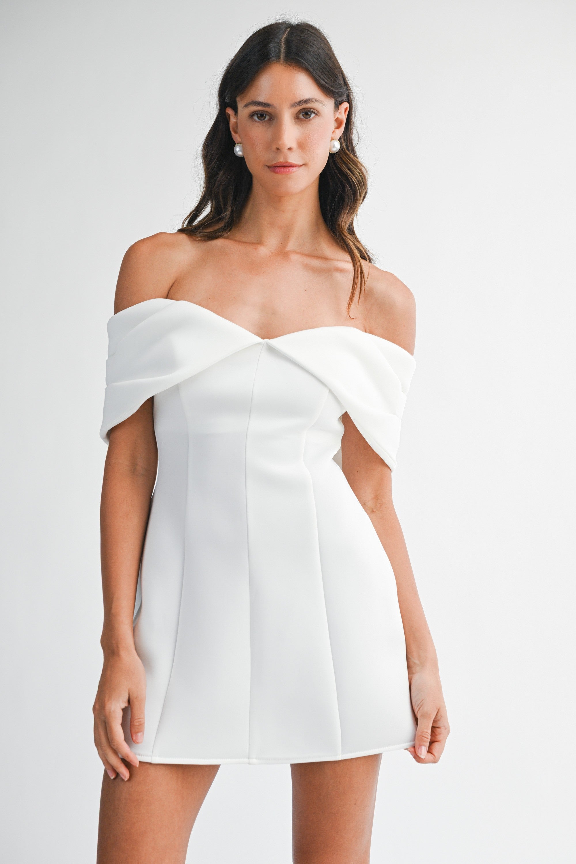 Front view of the Tina white scuba off-the-shoulder mini dress