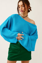 Open Back Cropped Sweater with slouchy fit.