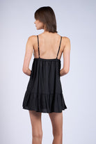 Back View: Annie Black Babydoll Dress styled for date night.