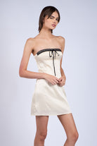 Ivory bodycon mini dress for graduation or bridal showers.