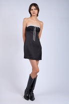 Lace-trimmed black strapless party dress with hidden back zipper
