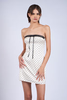 Ivory polka dot satin strapless mini dress with lace trim and ribbon detail
