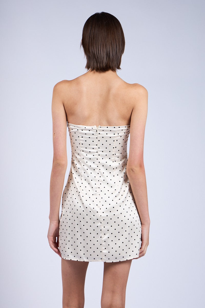 Back view of Laney ivory mini dress showing hidden zipper and bodycon fit.