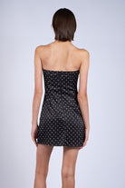 Back view of Laney black mini dress with hidden zipper and bodycon fit