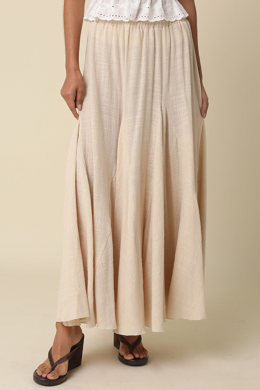 Beige boho maxi skirt for women with flowy godet panels