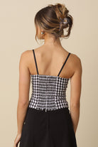 Back veiw black and white gingham bustier top.