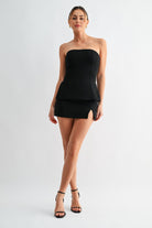 Chic white low-rise skort styled for a night out