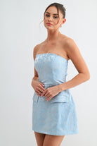 Side view of mini dress highlighting pocket