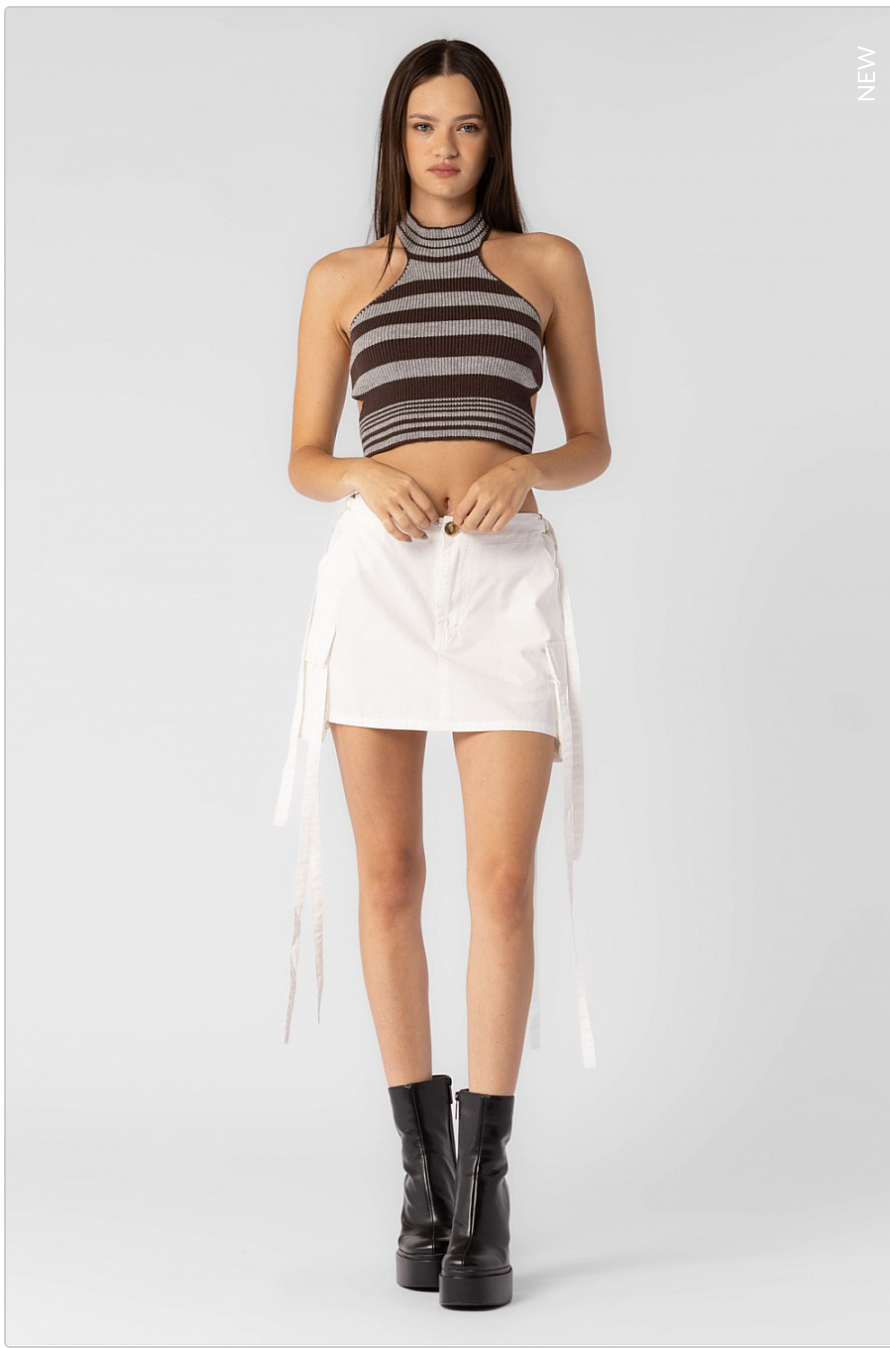 Chic winter-to-spring striped sweater with a daring backless silhouette.