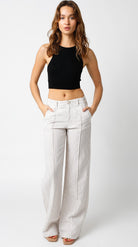 Women's wide leg khaki striped 100% linen pants with exposed seam detail and low rise fit