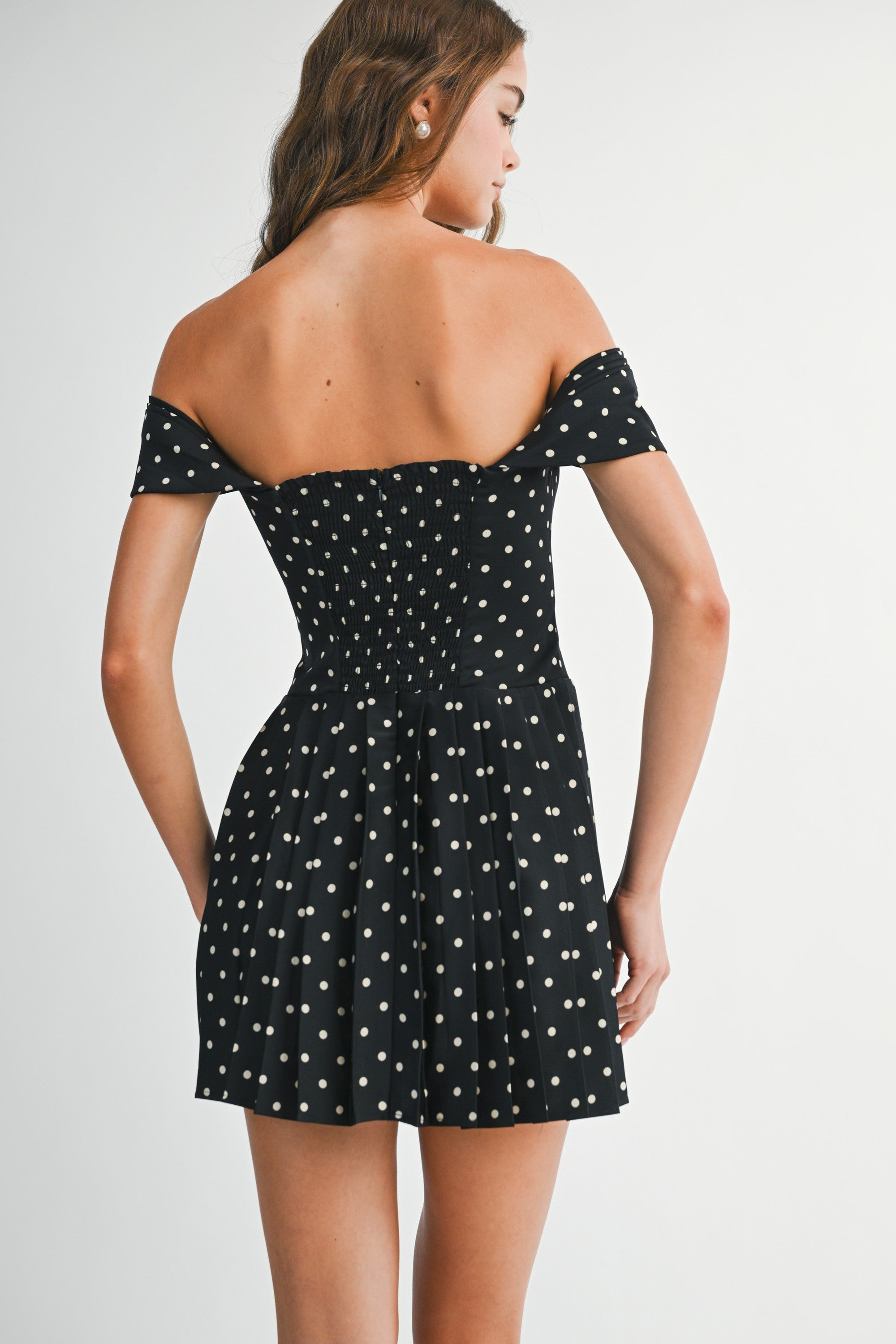 Back view of the Elyse dress highlighting with comfortable smocked panel