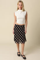 Model view of the mesh overlay of the Leia polka dot midi skirt