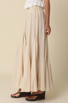 Beige cotton boho maxi skirt with elastic waist and godet silhouette