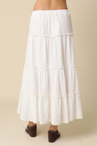 Flowy white tiered maxi skirt in boho summer style