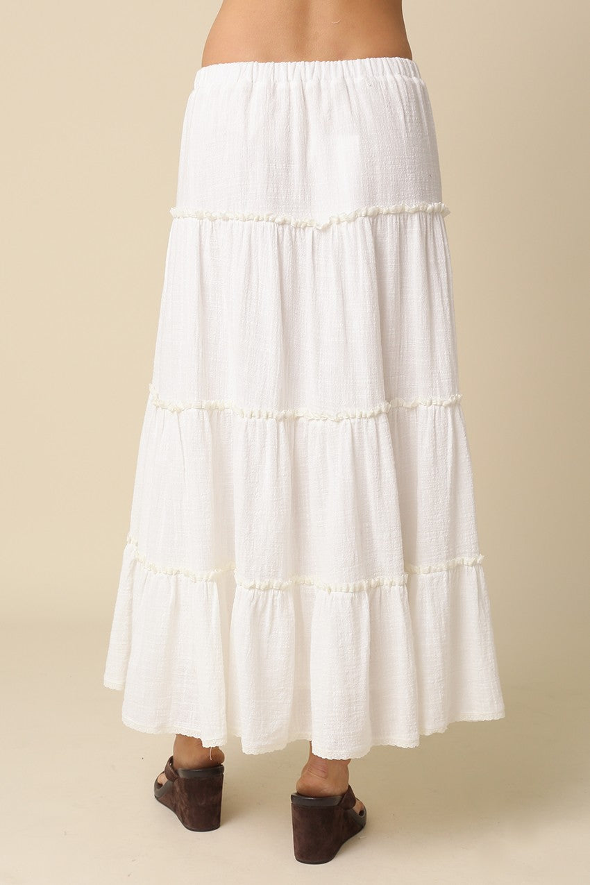 Flowy white tiered maxi skirt in boho summer style