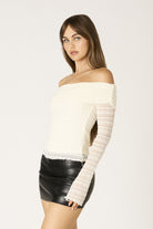 Summer vacation outfit featuring an ivory lace off-the-shoulder top