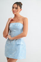 Close-up of floral textured jacquard fabric in sky blue