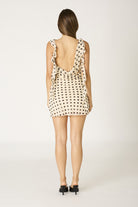 Katie polka dot ruffle mini dress back view