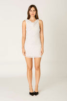 katie white polka dot ruffle mini dress front view