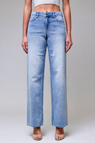Close up of the vintage light wash and high-quality stretch denim texture on the Monica dad jeans.