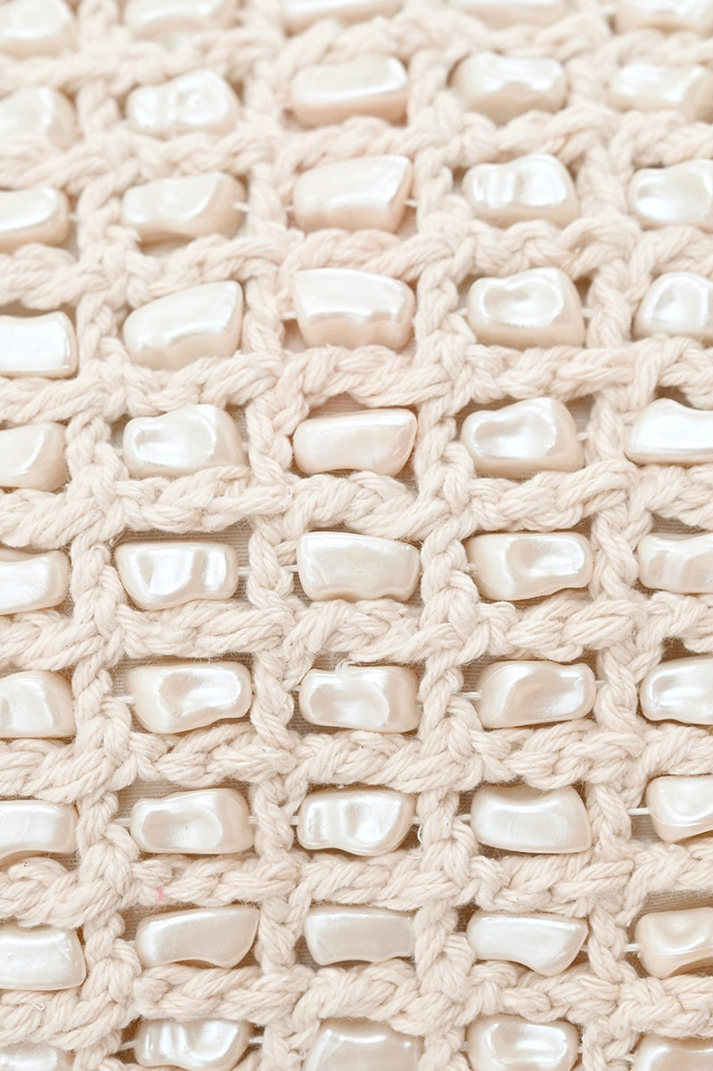 crochet and pearl clutch close up view