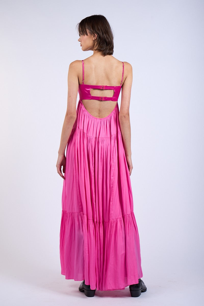 Back view of pink corset dress with cutout open back and straps