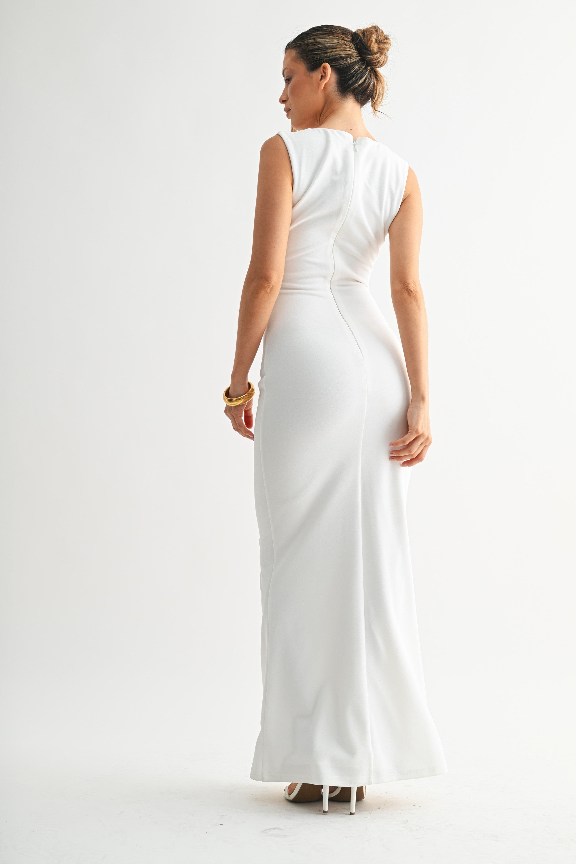 Back view of the Savanna white gown showing the seamless fit and hidden zipper