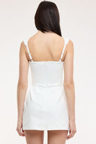 Women's white utility denim mini dress.