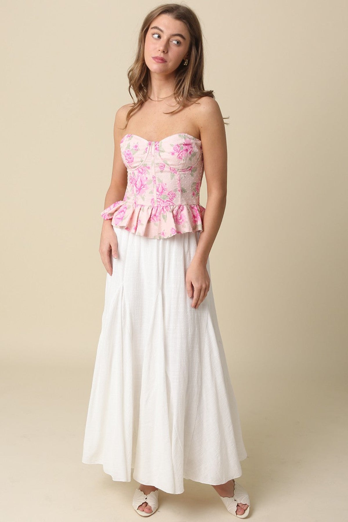 Women's white boho maxi skirt with flared godet inserts.